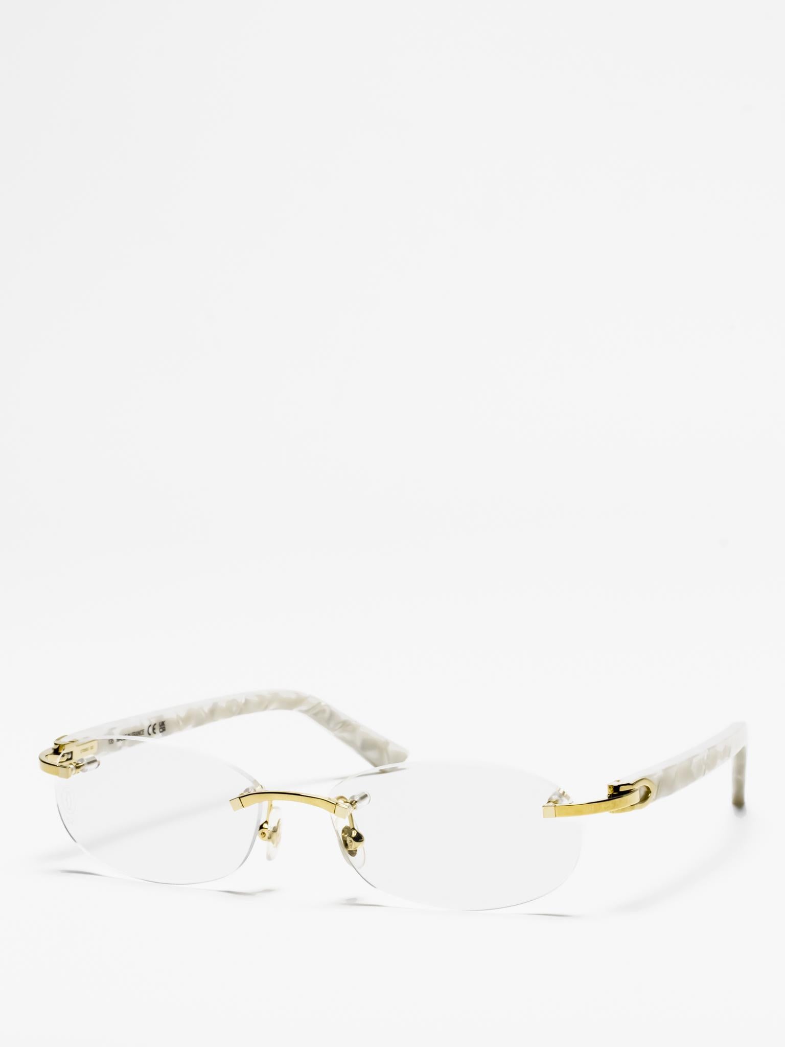 Cartier Modern Golden Rimless Eyewear Cartier CT0120O 001 Gold Glasses - US main image 3