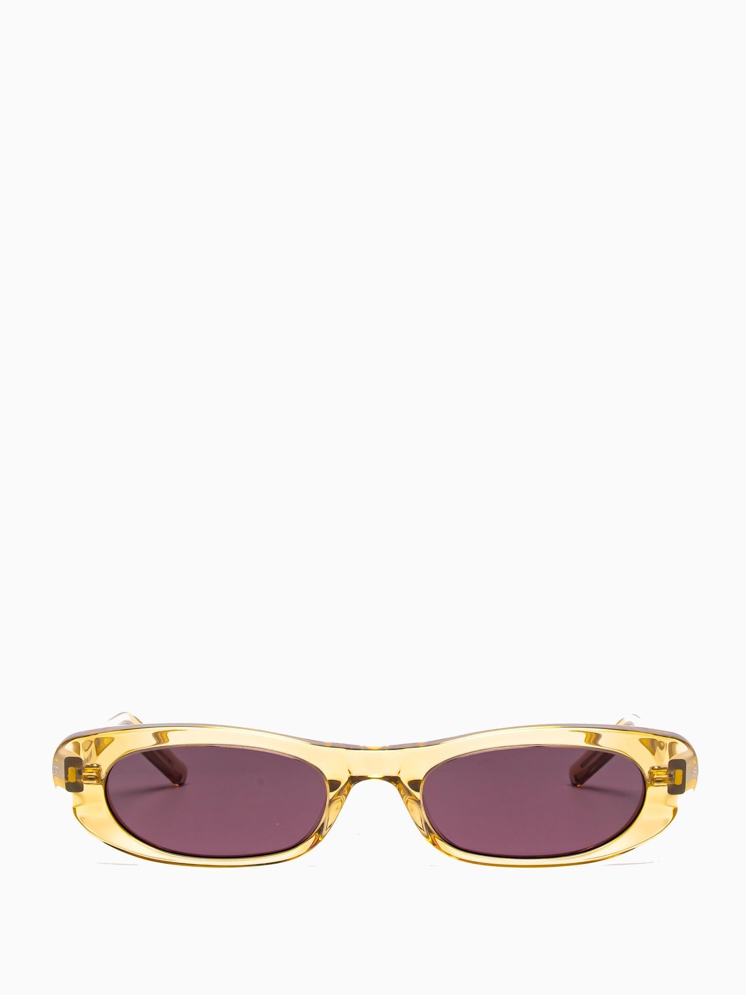 SL 557 007 TRANSLUCENT YELLOW OVAL SUNGLASSES